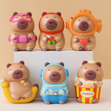 Six custom PU capybara squishy characters with colorful costumes, headphones and sculpted accessories
