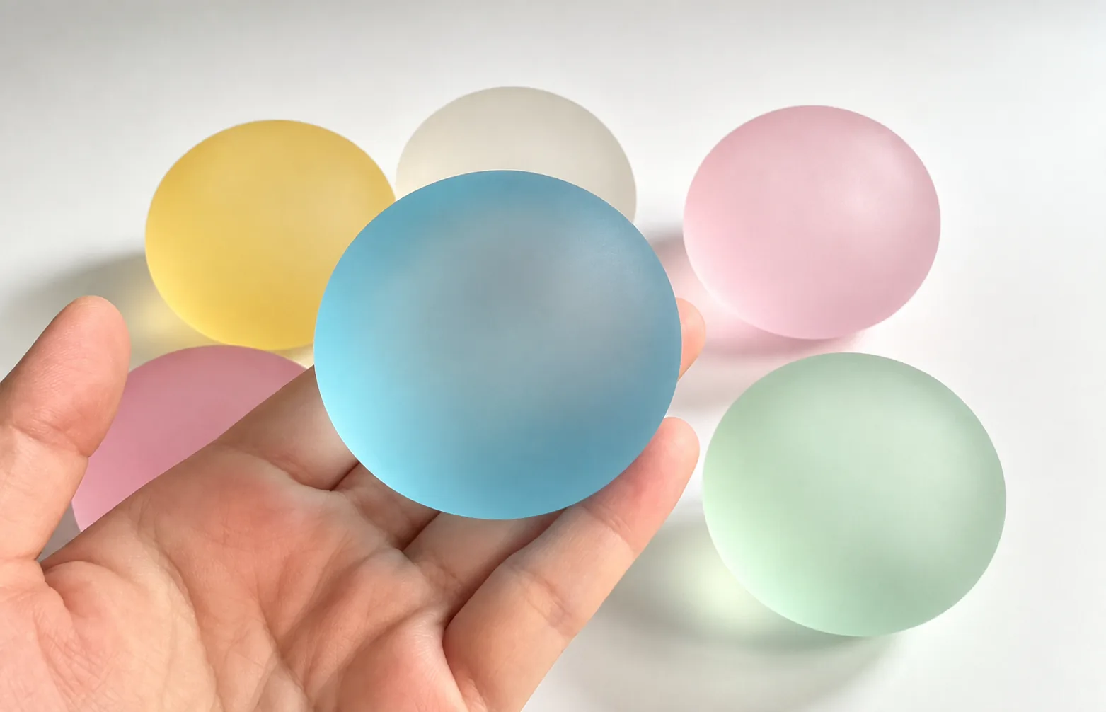 sea salt blue handmade moldable coconut oil squishy ball with pastel color options wholesale